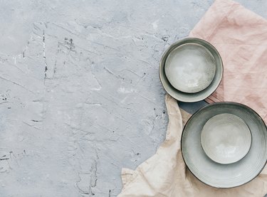 Ceramic bowls on a textured background