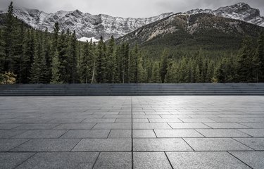 Empty patio front of forests and mountains
