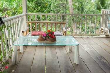 Thai-style seating on balcony in garden house