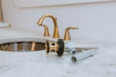 Bathroom, plumbing repair service, assemble and install sink