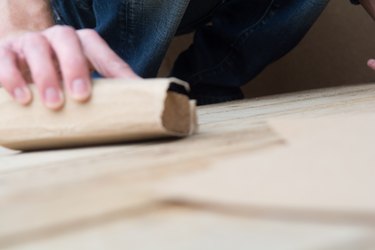 Carpenter working with wooden boards