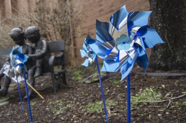 Toy pinwheels in garden.