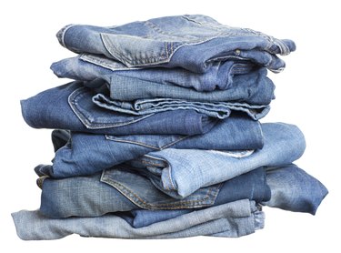 Heap of jeans before laundry.