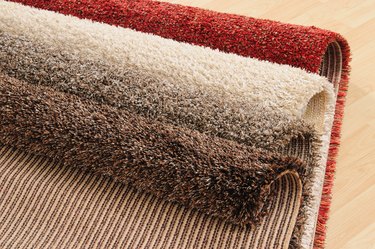 How to Keep a Rug from Bunching Up on Carpet