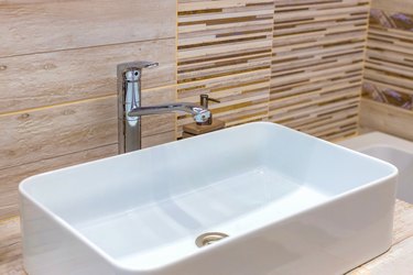 Bathroom interior sink with modern design in a modern residential building.