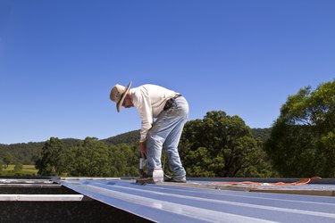 Man building a roof