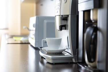 Mug stands in a coffee machine