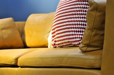 Colorful cushions on couch in home