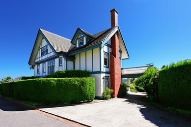 Craftsman style American house exterior with white and blue trim.