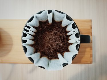 Directly Above Shot Of Ground Coffee In Filter