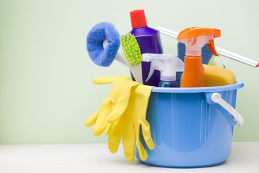 Bathroom cleaning products in bucket