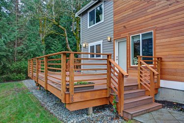 Charming newly renovated home exterior with mixed siding