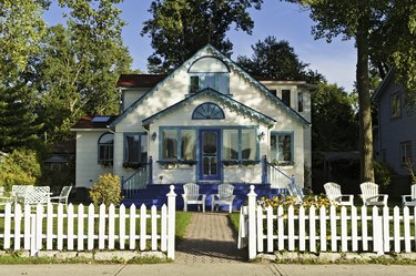 Pretty wooden cottage white picket fence Toronto Island Canada