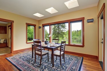 Bright dining room interior design with elegant table setting