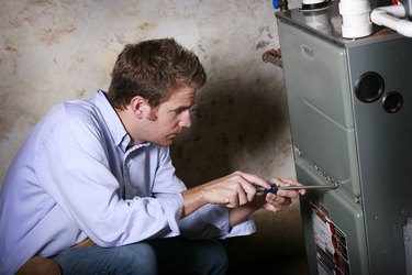 Service Man Working on Furnace