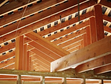 Roof support beams in home under construction
