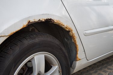 Rusty car wing.