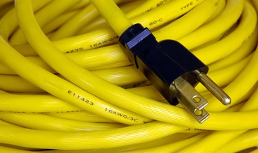 Yellow Extension Cord With Three-Prong Plug