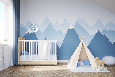 Baby's room with a bed and tent