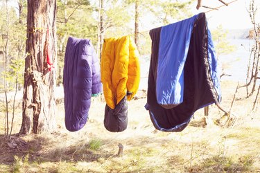Sleeping bags drying on a clothes line.