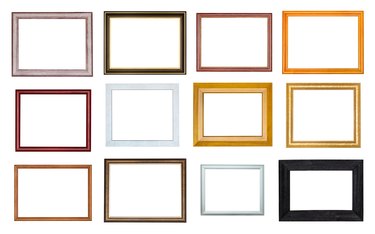 collection of various empty wooden picture frames