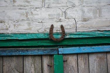 Old garage doors with a horseshoe