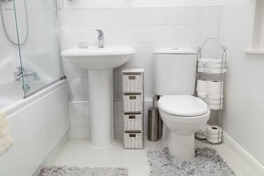 small white modern bathroom with tiles