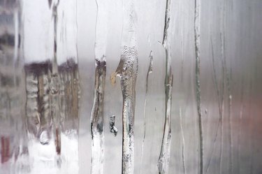 Misted glass Windows with icy potted streams.
