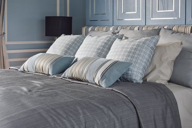 Light blue bedroom with pattern and texture of bedding