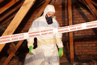 man removing asbestos