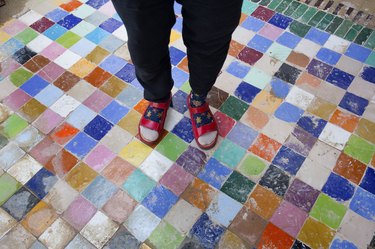 Multi coloured tile floor.