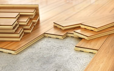 Stack of parquet. Timberwork, lumber work and woodwork industry concept: stacks of wooden timber planks on the wooden floor. 3d illustration