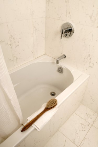 How To Remove Dark Stains From A Bathtub Hunker - How To Clean Black Spots In Bathroom