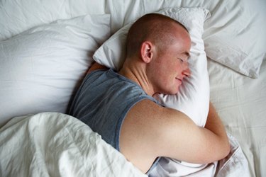 Man resting on comfortable pillow