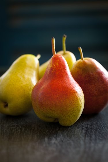 Ripe pears on dark backgound.