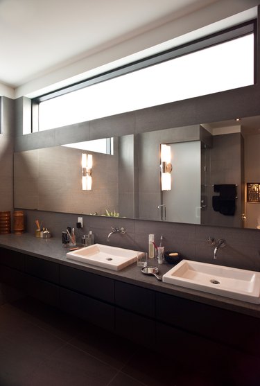 Luxury bathroom with dark laminate countertop