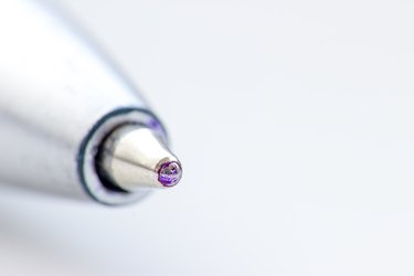 Close-Up Of Pen Over White Background