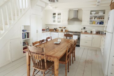 Interior View Of Kitchen With Wooden Dining Table