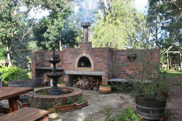 outdoor brick pizza oven and fountain