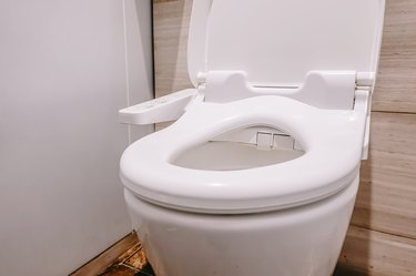 Modern high tech toilet with electronic bidet in Thailand. japan style toilet bowl, high technology sanitary ware.