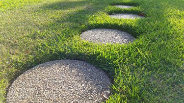 Stepping Stones On Grassy Field