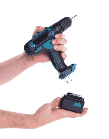 Cordless screwdriver or power drill isolated.