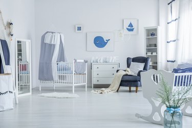 Spacious baby's room with crib