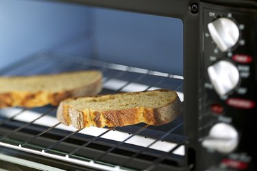 Toaster oven with slices of bread