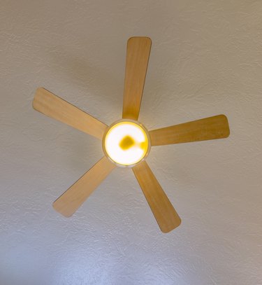 Ceiling fan looking up in model home.