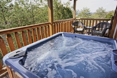 A empty running hot tub on the balcony