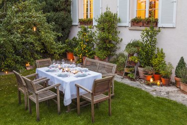 Autumnal laid table in garden in the evening