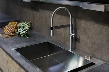 sink with a tap on a kitchen counter