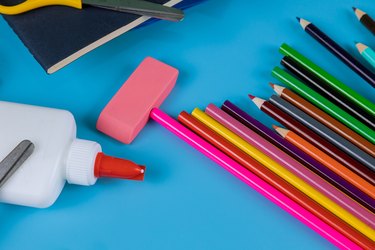 Student material on blue table, back to school