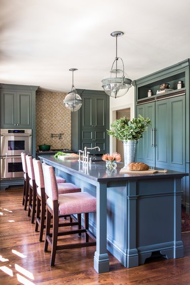 contemporary kitchen with blue Raised Panel Cabinetry